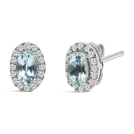 10K White Gold 5x3 MM Oval Blue Aquamarine and Diamond Halo Stud Earrings (I-J Color, I1-I2 Clarity) - Model View