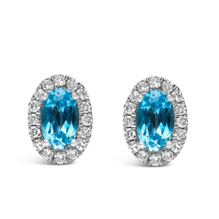 10K White Gold 5x3 MM Oval Blue Topaz and Diamond Halo Stud Earrings (I-J Color, I1-I2 Clarity)