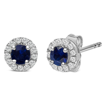10K White Gold 3.25mm x 3.25mm Round Blue Sapphire and 1/10 Cttw Diamond Halo Stud Earrings (I-J Color, I1-I2 Clarity) - Model View